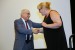 Dr. Nagib Callaos, General Chair, congratulating Prof. Alena Kocmanova for winning the best paper award of the session "Towards Business Sophistication and Sustainability I". The title of the awarded paper is "The Model of Environmental, Social and Corporate Governance Performance Indicators of a Company."